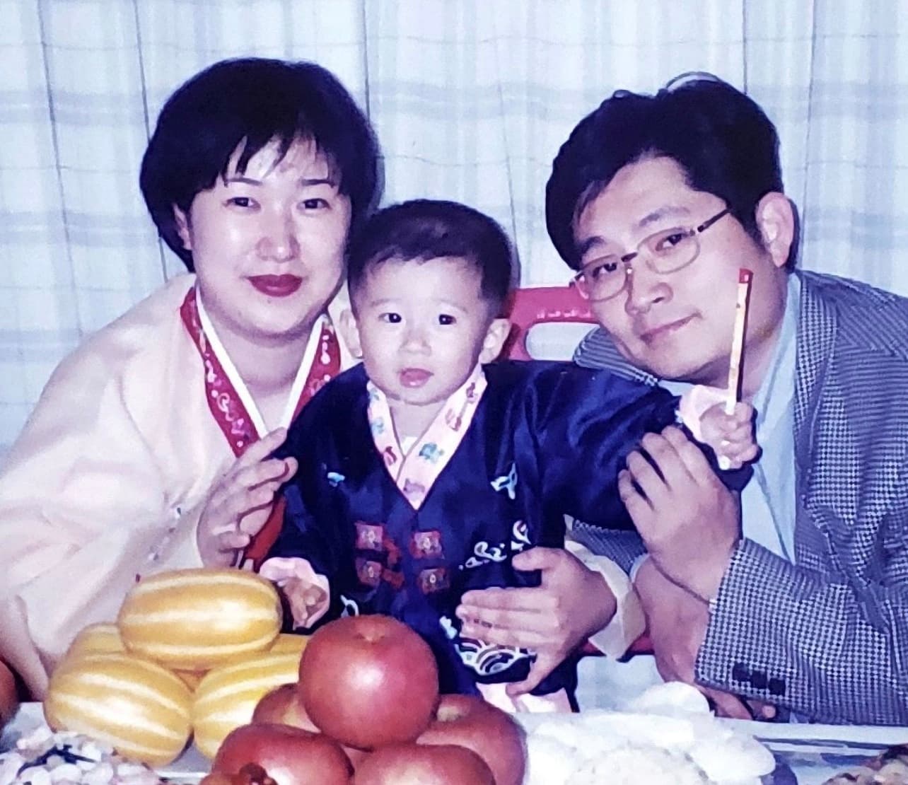 An old family photo of Jason as a kid with his family